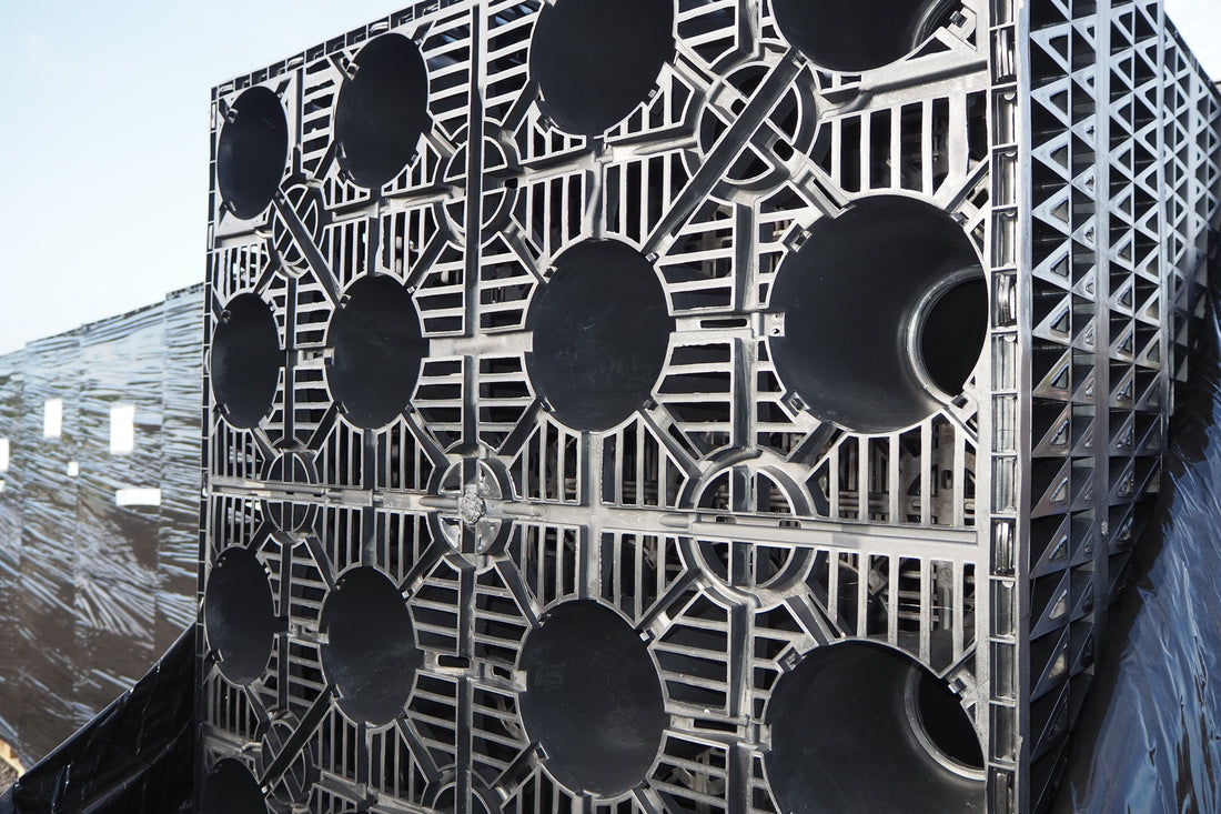 How can a soakaway reduce the risk of flooding?