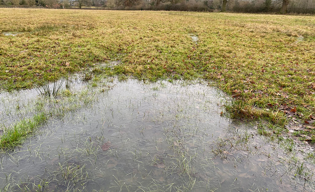 What is causing drainage and flooding issues on farms?